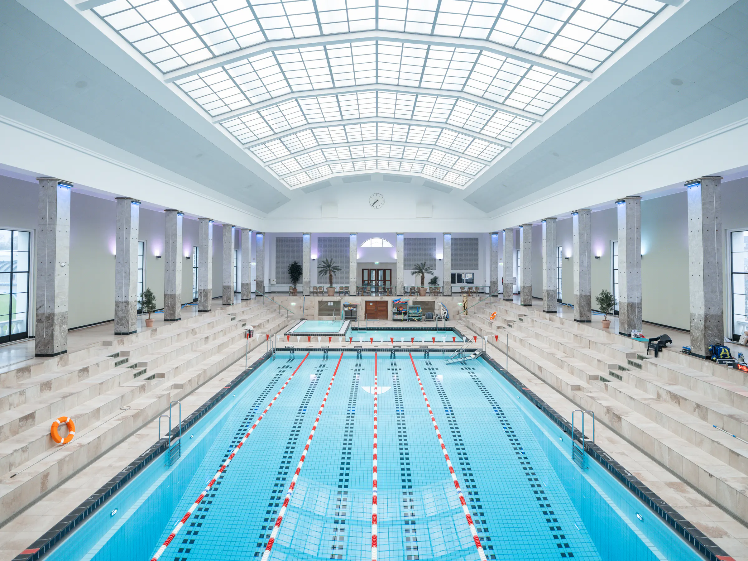 Symmetrical view across the historic pool hall at Øbro-Hallen