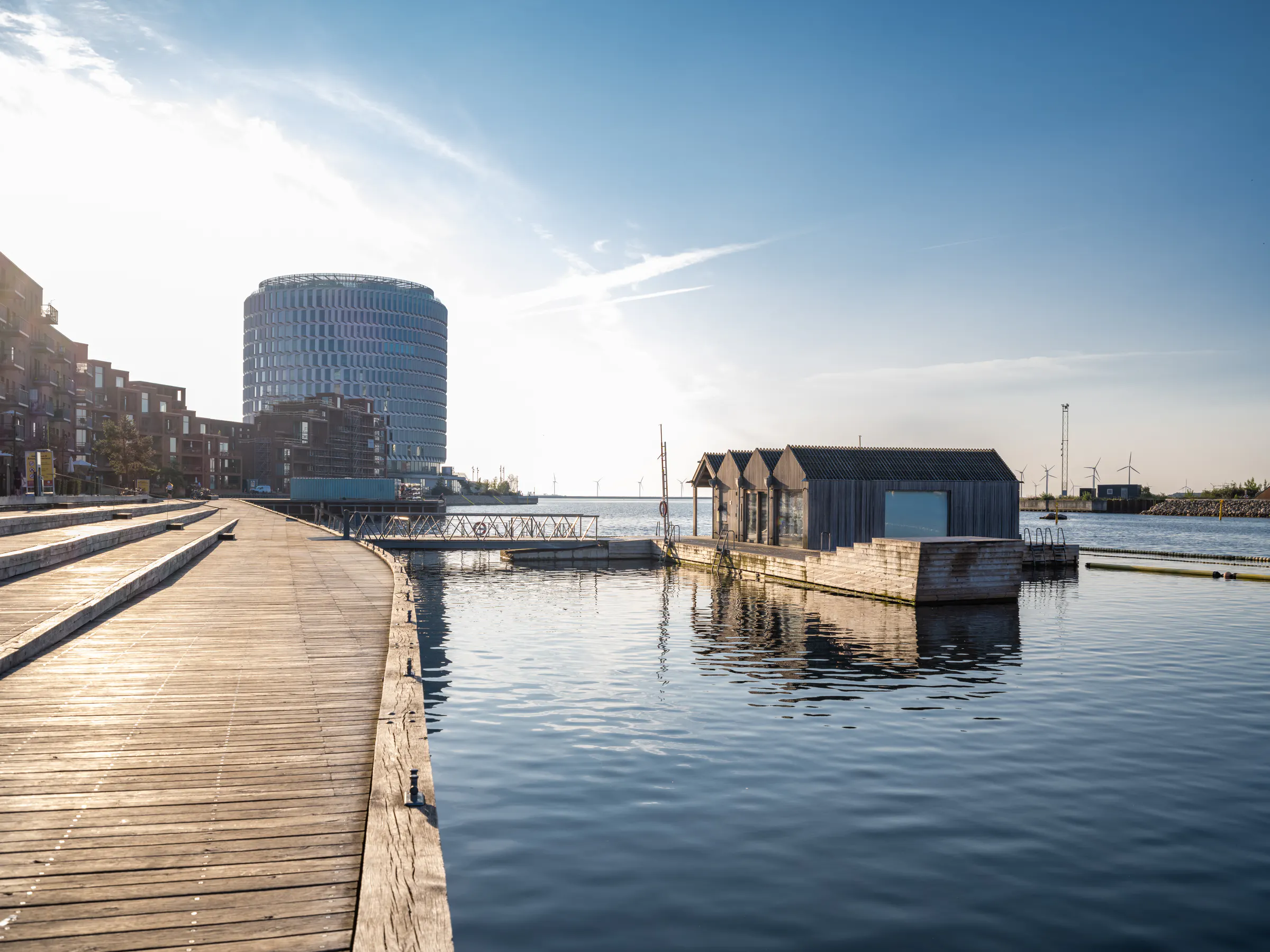 Sandkaj bathing zone with its timber promenade and bath house in Nordhavn